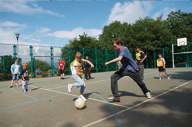 kids playing football