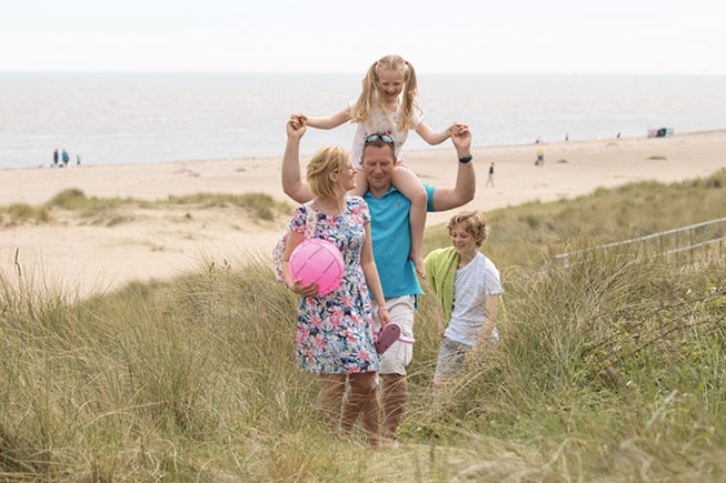 family on beach