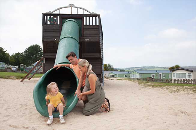 family in play park 