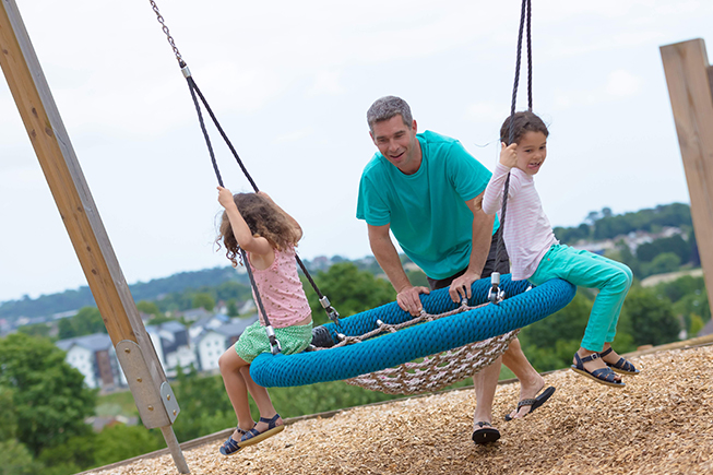 family on swing